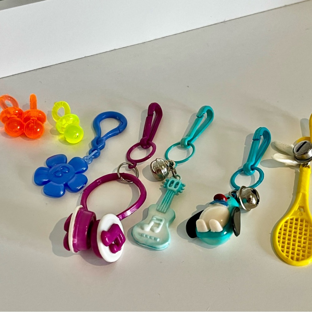 1980s bell charms clips toy collectible plus  soother pacifier from the 90s